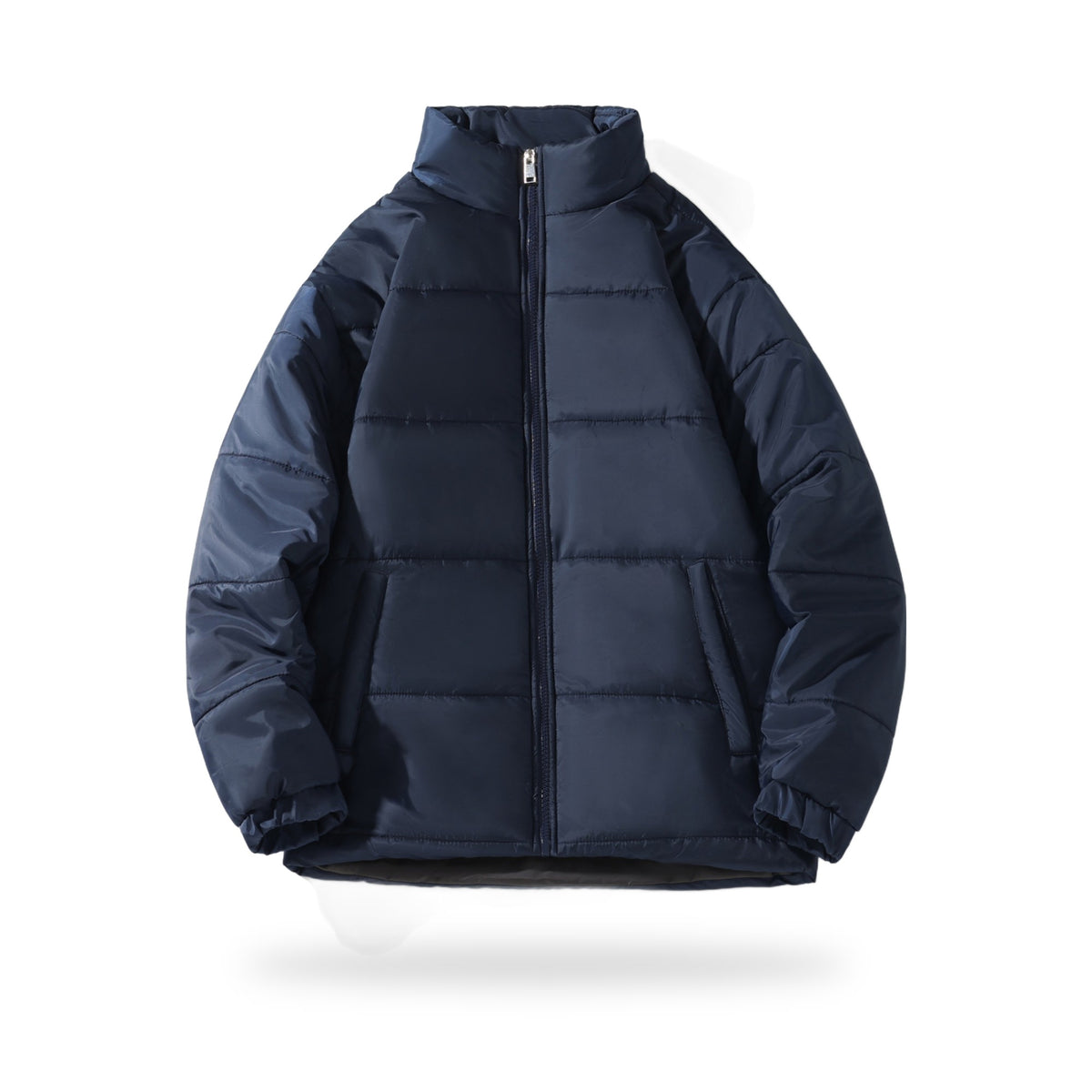 Stand-Collar Puffer in Dark Blue, photographed on a white background