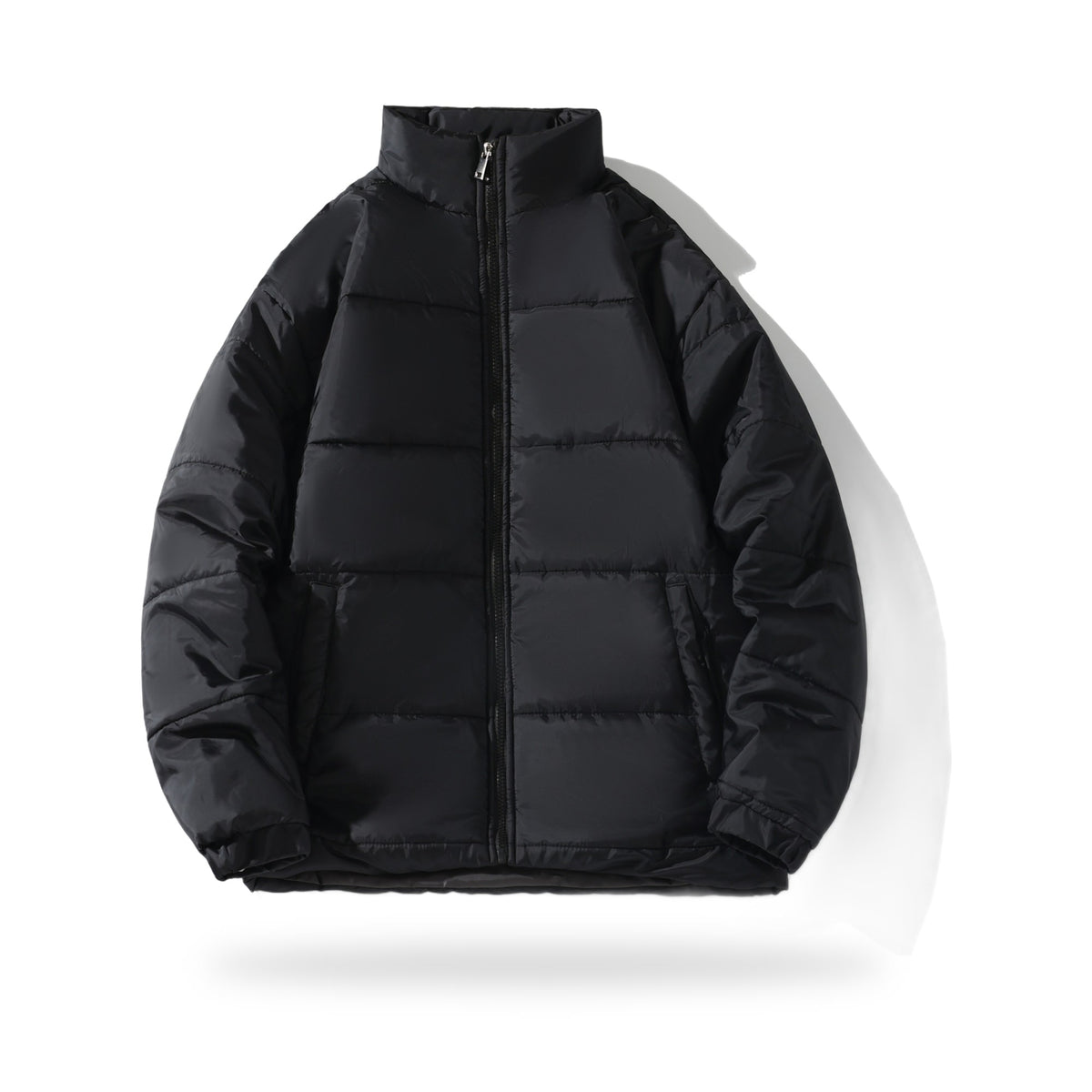 Stand-Collar Puffer in Black, photographed on a white background