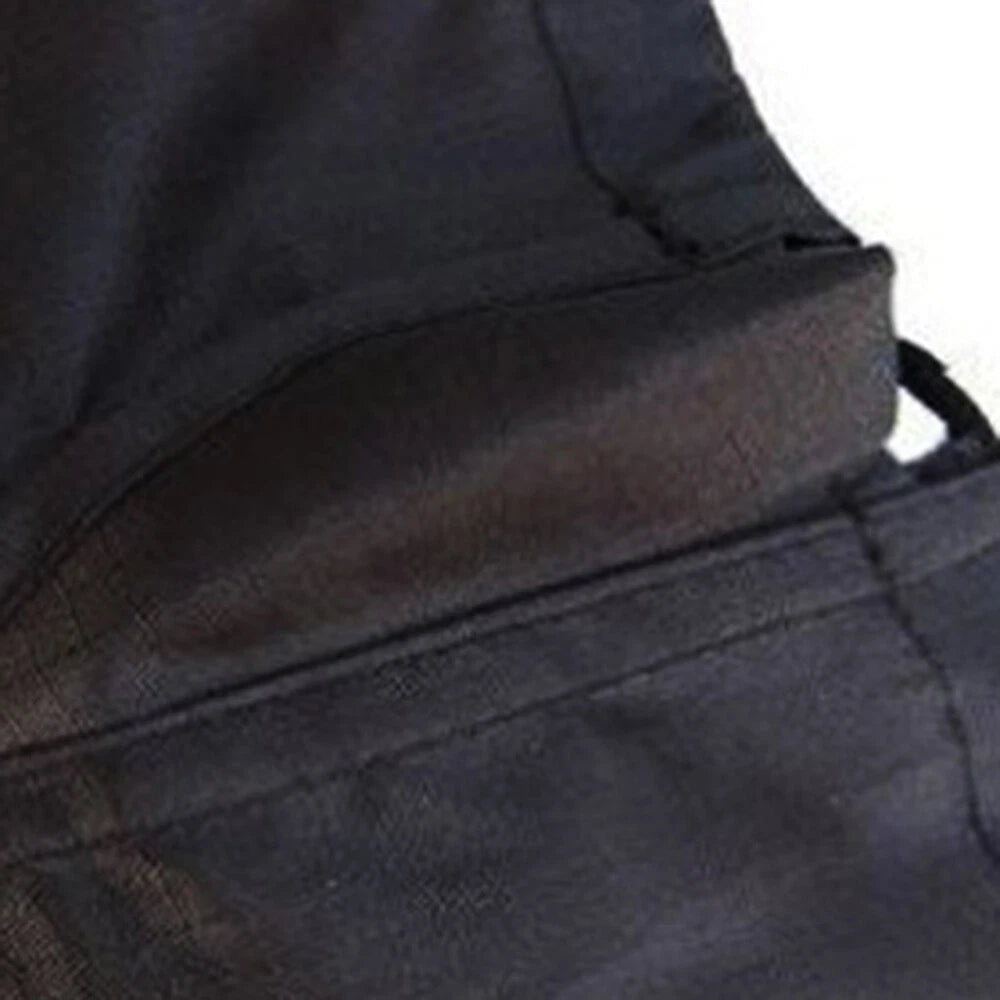 TrailCompress black sleeping bag compression sack, strap and closure detail